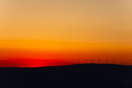 Wind turbines farm at sunset in southern Spain の写真素材