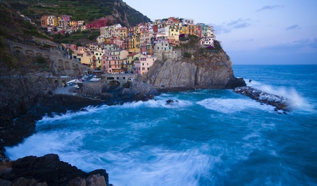 Manarola fisherman village in a dramatic wind storm  Manarola is one of five famous villages of Cinque Terre  Nationa park , suspended between sea and land on sheer cliffs upon the wild waves の写真素材