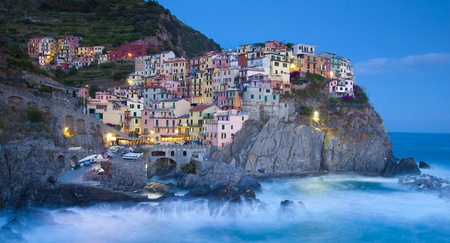 Manarola fisherman village in a dramatic wind storm. Manarola is one of five famous villages of Cinque Terre (Nationa park), suspended between sea and land on sheer cliffs upon the wild waves.の写真素材