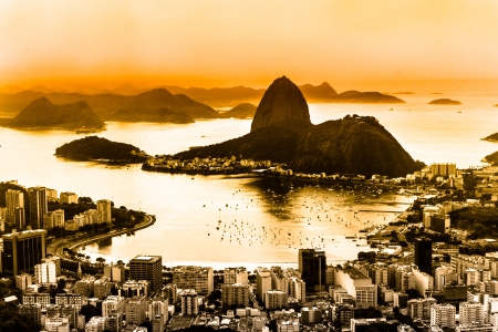 Rio de Janeiro, Brazil. Suggar Loaf and  Botafogo beach viewed from Corcovado at sunset.の写真素材