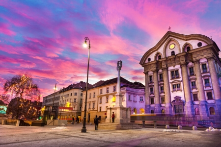 Ursuline Church of the Holy Trinity also Nun Church is a parish church in Ljubljana, the capital of Slovenia. It is located at Slovene Street, along the western border of Congress Square. Dramatic sunset shot.の写真素材