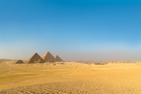 The pyramids of Giza, Cairo, Egypt;  the oldest of the Seven Wonders of the Ancient World, and the only one to remain largely intactの写真素材