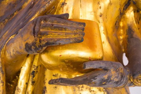 Golden ancient statue of Buddha.の写真素材