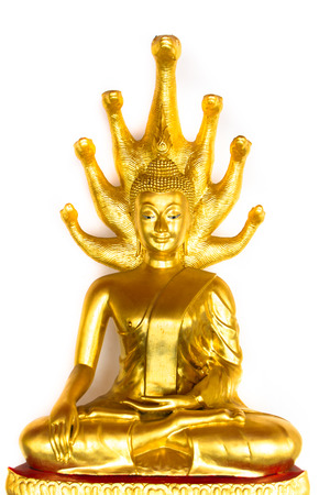 Golden ancient statue of teaching Buddha.の写真素材
