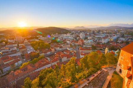 Panorama of the Slovenian capital Ljubljana at sunset. Alps mountainsの写真素材