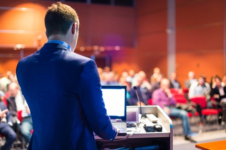 Speaker at Business Conference and Presentation. Audience at the conference hall.