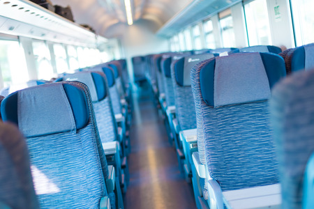 Modern european economy class fast train interior  Inside of high speed train compartment の写真素材