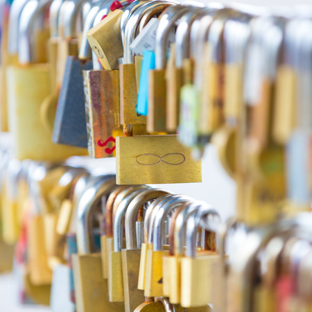 Lockers at the bridge symbolize love for ever. Lovers lock the locker on fance and throw key in...