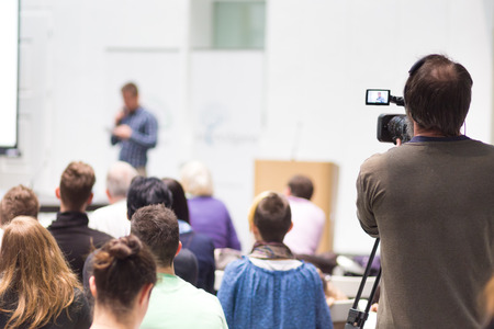 Business Conference and Presentation. Audience at the conference hall. Television broadcasted press conference.の写真素材