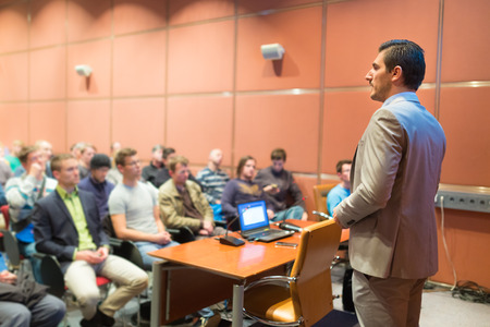 Speaker at Business Conference with Public Presentations. Audience at the conference hall. Business and Entrepreneurship concept. Background blur. Shallow depth of field.の写真素材