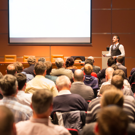 Speaker at Business Conference and Presentation. Audience at the conference hall. Business and Entrepreneurship.