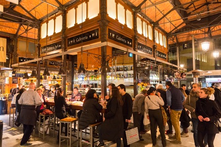 Madrid, Spain - Jan 25, 2016:  People eat and drink at Mercado San Miguel on January 25th, 2016 in Madrid, Spain. According to Tripadvisor it is one of top tourist sites in Madrid.のeditorial素材