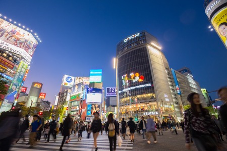 Tokyo, Japan - November 6, 2015: Pedestrians cross at Shibuya Crossing on November 6th in Tokyo, Japan, 2015 . Shibuya Crossing is one of the busiest crosswalks in the world.のeditorial素材