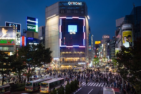 Tokyo, Japan - November 6, 2015: Pedestrians cross at Shibuya Crossing on November 6th in Tokyo, Japan, 2015 . Shibuya Crossing is one of the busiest crosswalks in the world.のeditorial素材