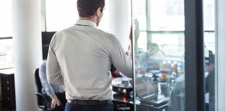 Business man making a presentation at office. Business executive delivering a presentation to his...