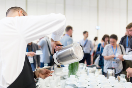 Coffee break at conference meeting. Business and entrepreneurship.の写真素材