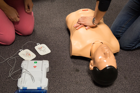First aid cardiopulmonary resuscitation course using automated external defibrillator device, AED.の写真素材