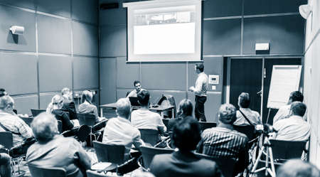 Business speaker giving talk at business conference event.の写真素材