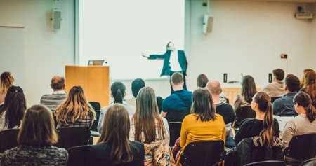 Audience in lecture hall on scientific conference.の写真素材