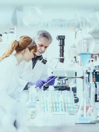 Health care researchers working in scientific laboratory.の写真素材