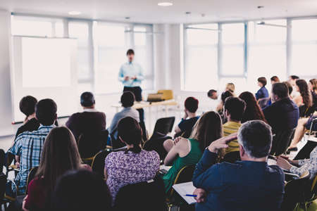Speaker giving presentation on business conference eventの写真素材