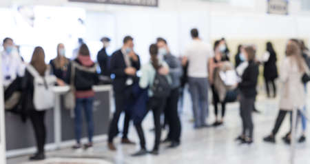 Abstract blured people at exhibition hall of expo event trade show. Business convention show or job fair. Business concept background.の写真素材
