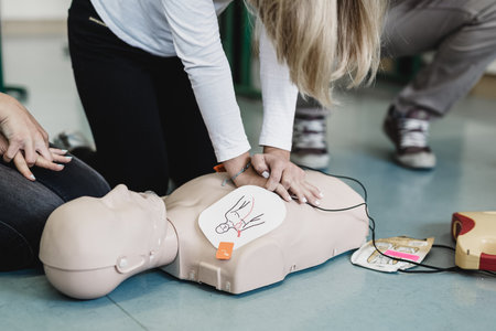 First aid cardiopulmonary resuscitation course using automated external defibrillator device, AED.の写真素材