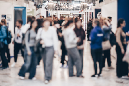 Abstract blurred people at exhibition hall of expo event trade show. Business convention show or job fair. Business concept background.の写真素材