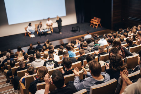 Interview and round table discussion at business convention and presentation. Audience at the conference hall. Business and entrepreneurship symposium.の写真素材
