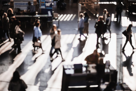 Abstract blurred people at exhibition hall of expo event trade show. Business convention show or job fair. Business concept backgroundの写真素材