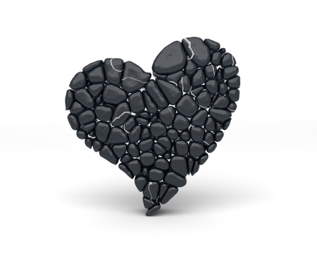 The shape of the heart from polished shiny pebbles on white background の写真素材