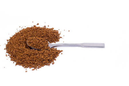 heap of ground coffee with a spoon, isolate, coffee addictionの写真素材
