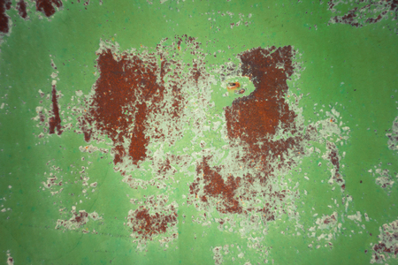 Rusty iron sheet with green photons ( shade )の写真素材