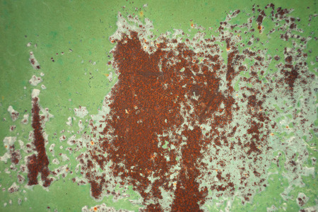 Rusty iron sheet with green photons ( shade )の写真素材