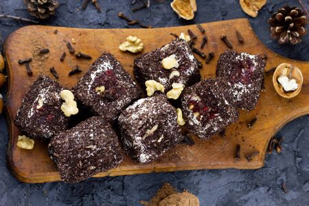 Winter chocolate sweets. Pieces of chocolate pastries.