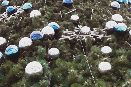 Christmas balls on the tree. Decorated Christmas tree for Christmas . Christmas decorationの写真素材