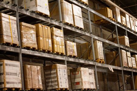 racks with large boxes, storage warehouse. Room for storing parcels. Shop-warehouseの写真素材