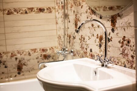 luxury washbasin in the hotel. Designer bathroom in the Spa . Washbasin close-up, soft focus