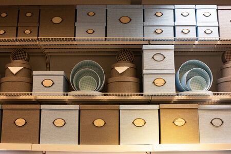 set of empty boxes at the supermarket. Paper empty boxes with interesting design on the shelves in the store.の写真素材