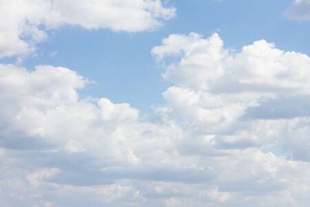 blue sky with lots of clouds. natural clean background with copy space.の写真素材