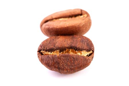 group of isolated roasted coffee beans, close up. Natural Cocoa Fruitsの写真素材
