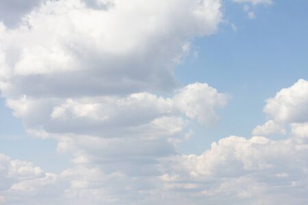blue sky with lots of clouds. natural clean background with copy space.の写真素材