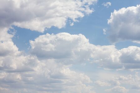 blue sky with lots of clouds. natural clean background with copy space.の写真素材