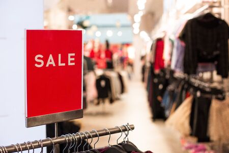 a sign with the inscription sale in a clothing store and a place for an inscription. Boutique billboardの写真素材