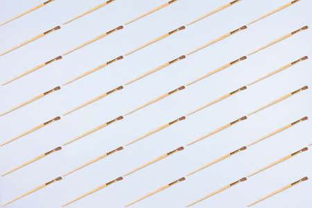 Brushes on a light blue background. School background. Education concept. Pattern.の写真素材
