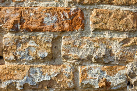 old red brick texture close up, rough surface of rough stoneの写真素材