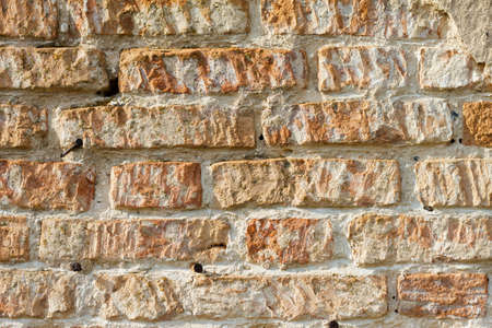 old red brick texture close up, rough surface of rough stoneの写真素材