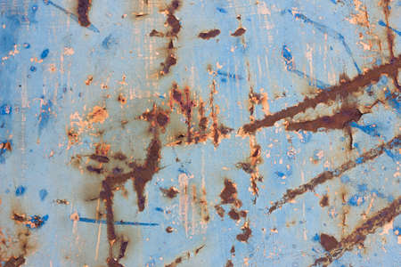 Rusty Colored Metal Texture. The Old Iron Surface Is Worn. Cracked Paint