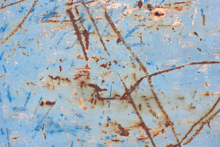 rust with scuffed paint texture . Scratched metal texture with paint. Texture of smeared paintの写真素材