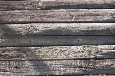 texture of the old fence . old village fence closeup . Old rough wooden backgroundの写真素材